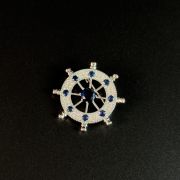 Silver nautical blue crystal ship’s wheel brooch